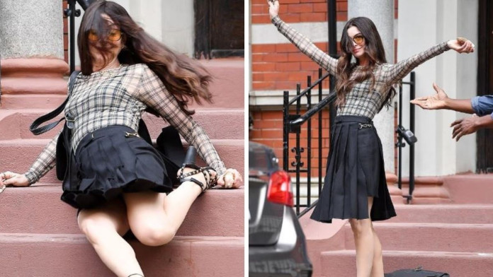 Anne Hathaway Falls on Devil Wears Prada 2 Set