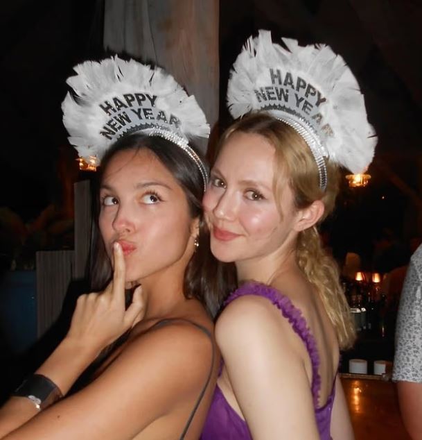 Olivia Rodrigo Rings in 2026 With Friends After Louis Partridge Split 3 Meanwhile she also donned novelty 'Happy New Year' headbands in other pictures from her latest album