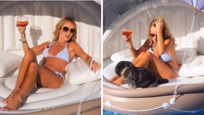 Amanda Holden Stuns in Baby Blue Bikini During Poolside Pet Campaign
