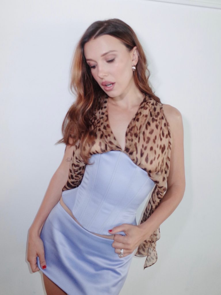 Millie looked sensational as she went braless in a plunging satin corset and matching mini-skirt for a glamorous new photoshoot.Credit: Instagram